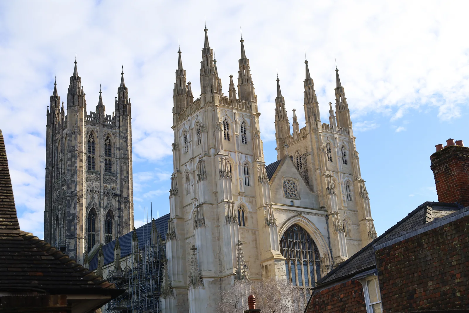 Gothic towers and stone fa&ccedil;ades of Canterbury Cathedral viewed from its precincts