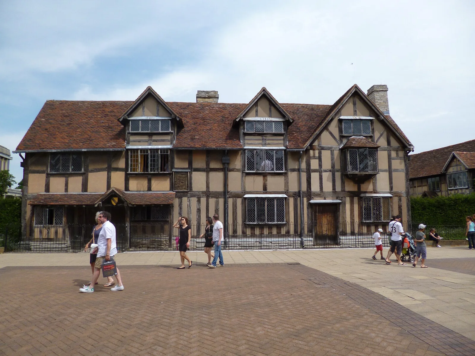 Timber-framed Shakespeare&rsquo;s Birthplace with visitors outside on Henley Street
